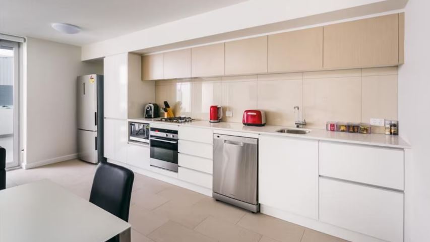 Hamilton Executive Apartments Newcastle — apartment bedroom and furnishings